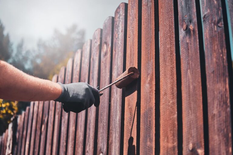 Sun Rising Over Fence Protect Your Fence from Sun Damage